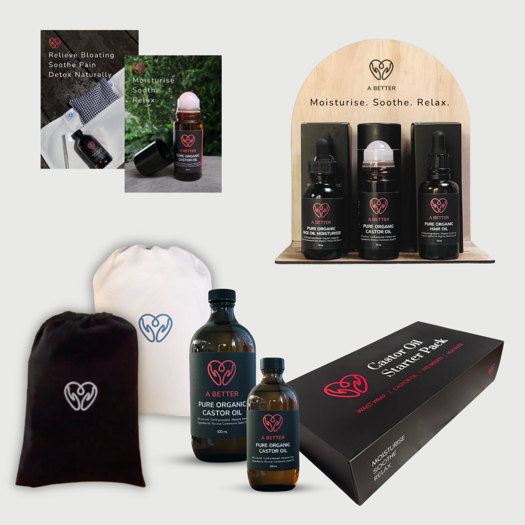 Collection of A Better Pure Organic Castor Oil products including bottles, a box, and promotional materials.